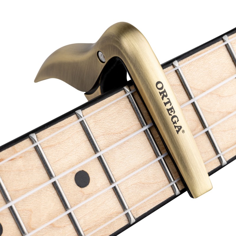 ORTEGA Ukulele kapo - Brushed Brass Design
