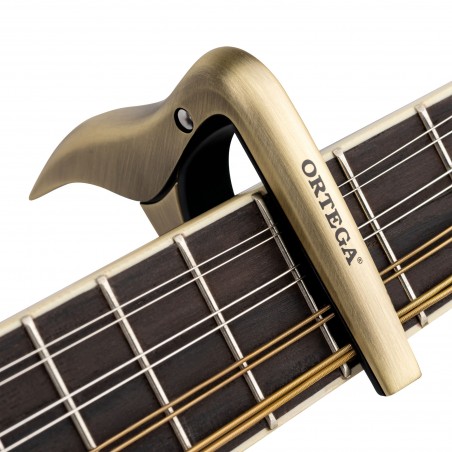 ORTEGA Ukulele kapo - Brushed Brass Design